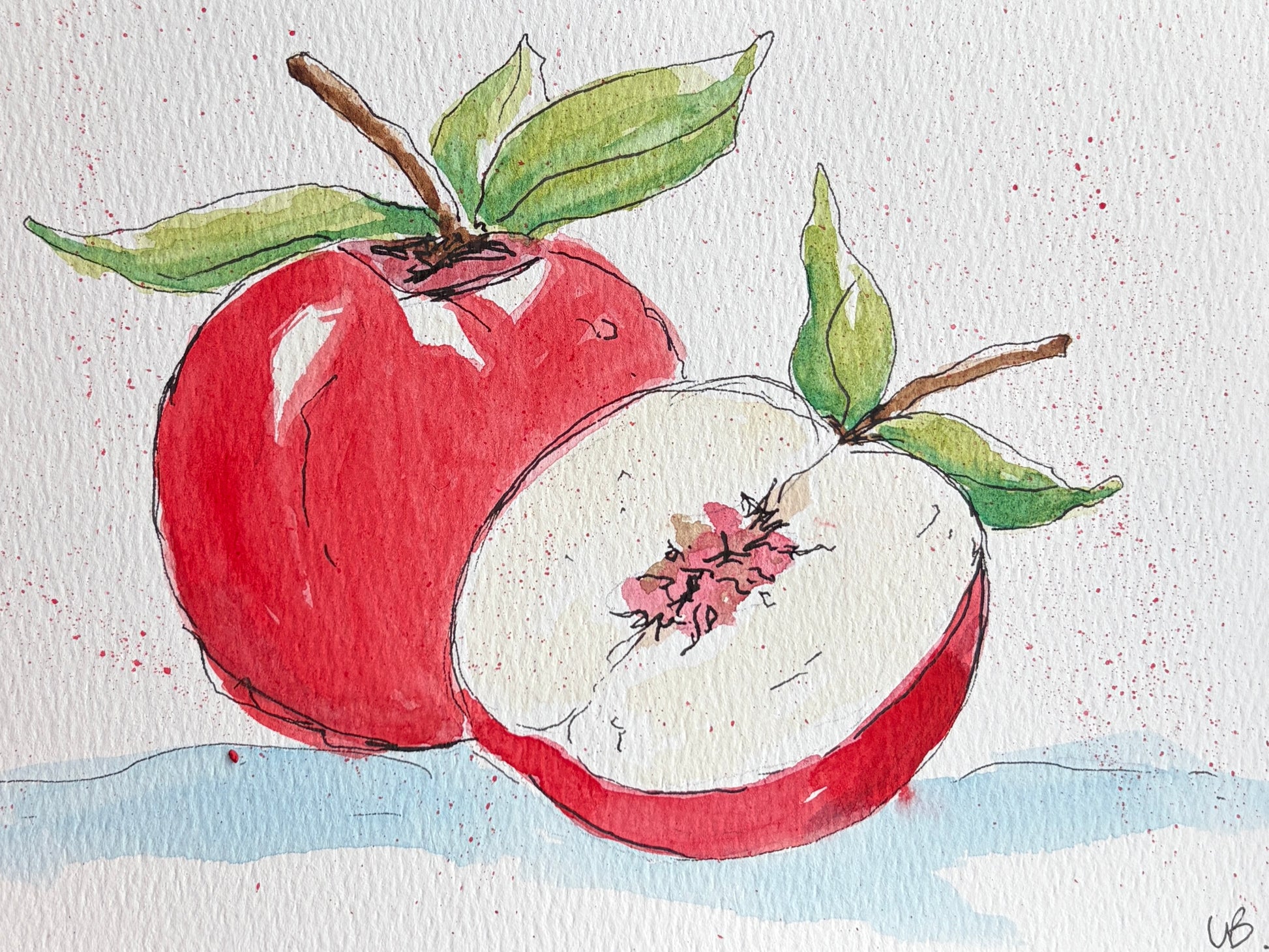 Watercolor and ink painting of a whole red apple and a halved apple with green leaves and red paint splatter