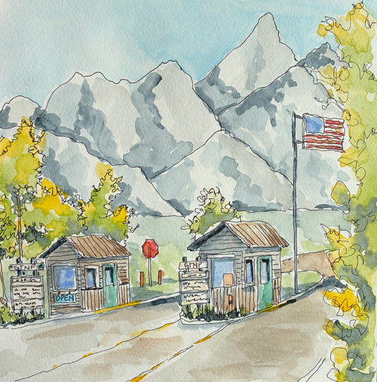Watercolor and ink painting of the Grand Teton National Park entrance station in Moose, Wyoming with American flag and mountain backdrop