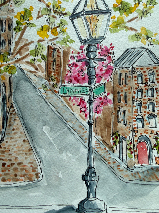 Close-up of the Lynnie Street watercolor showing the lamp post, street sign and pink blooms