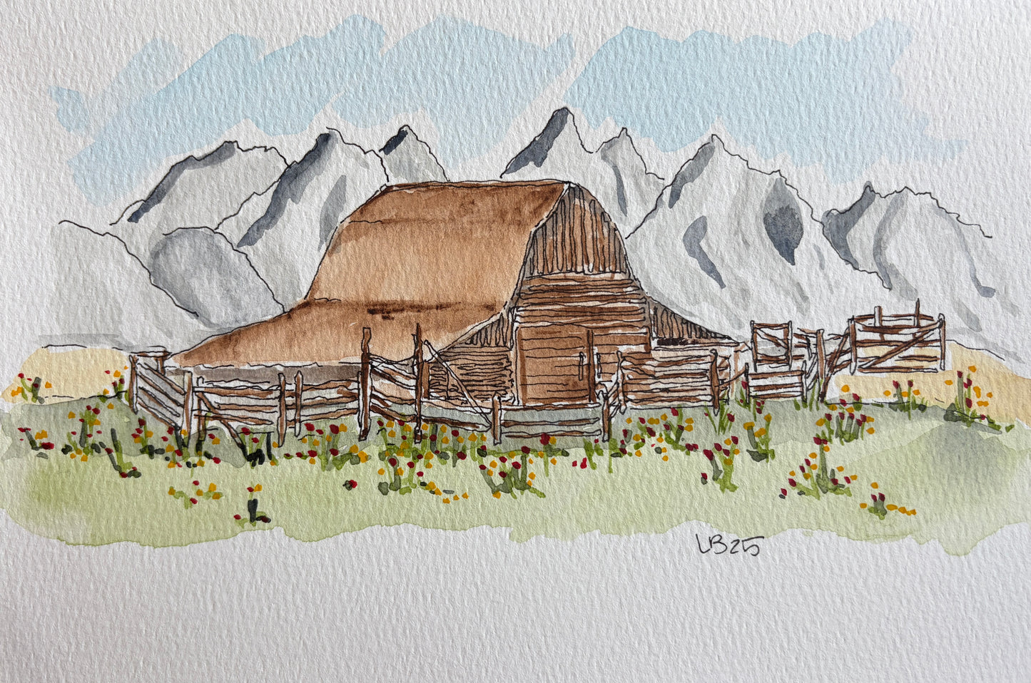 This is a watercolor and ink painting depicting a historic barn on Mormon Row with the Grand Teton mountains in the background.The scene features the rustic wooden structure surrounded by wild flowers and a wooden fence.The painting style combines delicate watercolor washes for the sky and mountains with fine ink lines to define the barn's texture and details