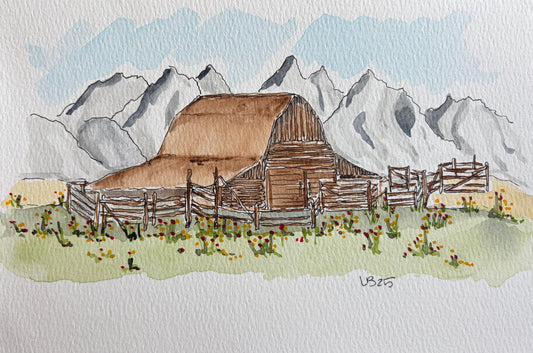 This is a watercolor and ink painting depicting a historic barn on Mormon Row with the Grand Teton mountains in the background.The scene features the rustic wooden structure surrounded by wild flowers and a wooden fence.The painting style combines delicate watercolor washes for the sky and mountains with fine ink lines to define the barn's texture and details